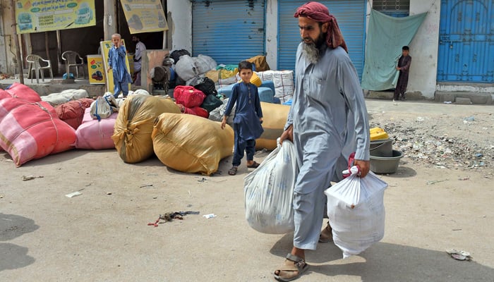 Unregistered Afghan families prepare to leave Pakistan on Friday, October 6, 2023. — Online