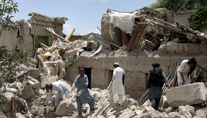 Afghan men search for survivors amidst the debris of a house that was destroyed by an earthquake in Gayan, Afghanistan, June 23, 2022. — Reuters