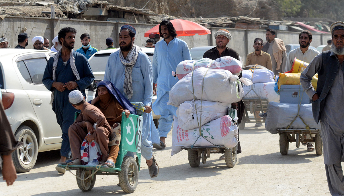 Afghan refugees in Pakistan move towards the Pak-Afghan Torkham Border with their families, as they prepare to leave on October 7, 2023. — INP