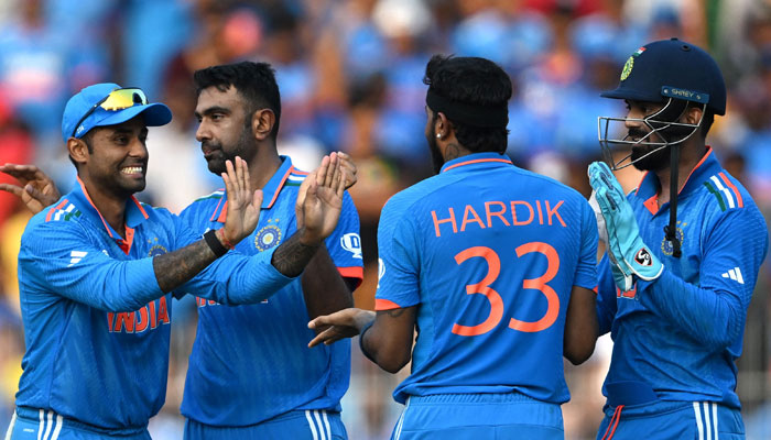 India’s Ravichandran Ashwin (2L) celebrates after the dismissal of Australia’s Cameron Green during the 2023 ICC Men´s Cricket World Cup one-day international (ODI) match between India and Australia at the MA Chidambaram Stadium in Chennai on October 8, 2023. — AFP