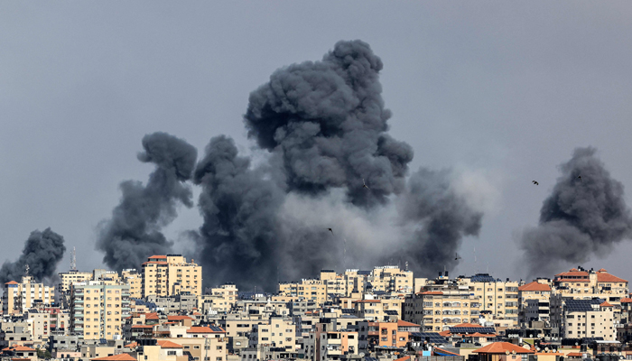 Smoke rises over Gaza City on October 7, 2023, during Israeli air strikes. — AFP