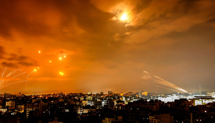 Rockets from Gaza City are intercepted by the Israeli Iron Dome in the early hours of October 8, 2023. — AFP