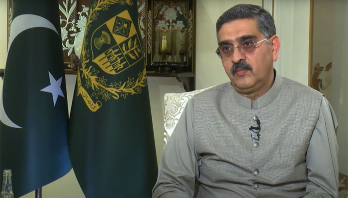 Caretaker Prime Minister Anwaar-ul-Haq Kakar speaks in an interview with journalists in this still taken from a video on October 8, 2023. — YouTube/Talk SHOCK