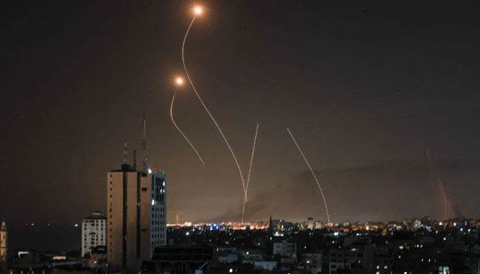Israeli air defence system Iron Dome intercepting rockets amid the Hamas attack on Israel on October 9, 2023. — AFP