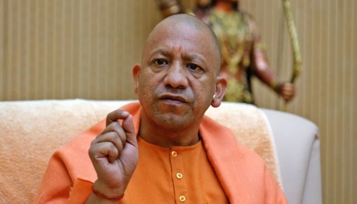 Chief Minister of Uttar Pradesh Yogi Adityanath gestures during an interview with Reuters at his official residence in Lucknow, India, February 7, 2023 — Reuters