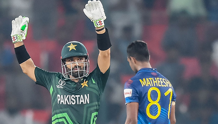Pakistans Mohammad Rizwan (left) celebrates during the 2023 ICC Men´s Cricket World Cup one-day international (ODI) match between Pakistan and Sri Lanka at the Rajiv Gandhi International Stadium in Hyderabad on October 10, 2023. — AFP