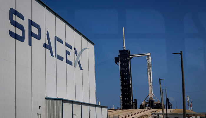 A SpaceX Falcon 9 rocket with the Crew Dragon spacecraft sits on Launch Complex 39A after its launch was scrubbed at the Kennedy Space Center on August 25, 2023, in Cape Canaveral, Florida. — AFP