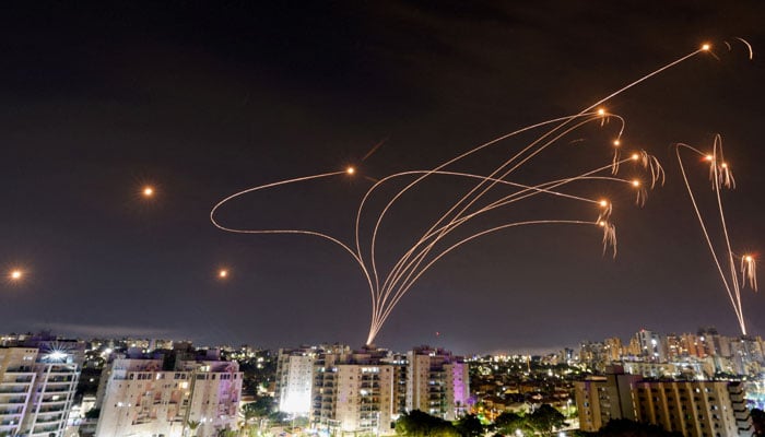 Israels Iron Dome anti-missile system intercepts rockets launched from the Gaza Strip, as seen from the city of Ashkelon, Israel October 9, 2023. — Reuters