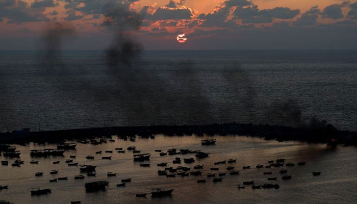 Smoke rises after Israeli strikes on the seaport of Gaza City, in Gaza, October 10, 2023.— Reuters