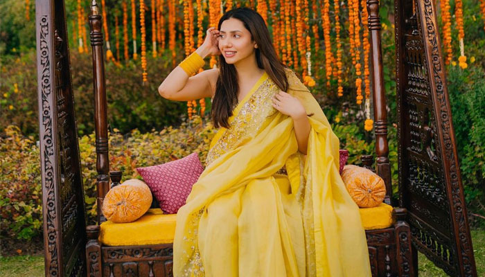 Pakistani actor Mahira Khan poses on a swing. — Instagram/@mahirahkhan