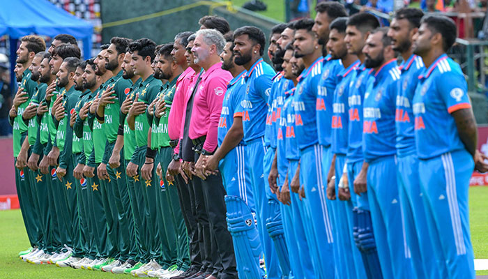 Pakistan´s and India´s players stand for national anthems before the start of the Asia Cup 2023 one-day international (ODI) cricket match between India and Pakistan at the Pallekele International Cricket Stadium in Kandy on September 2, 2023. — AFP