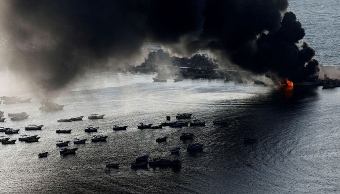 Smoke rises after Israeli strikes on the seaport of Gaza City, in Gaza, October 10. —Reuters