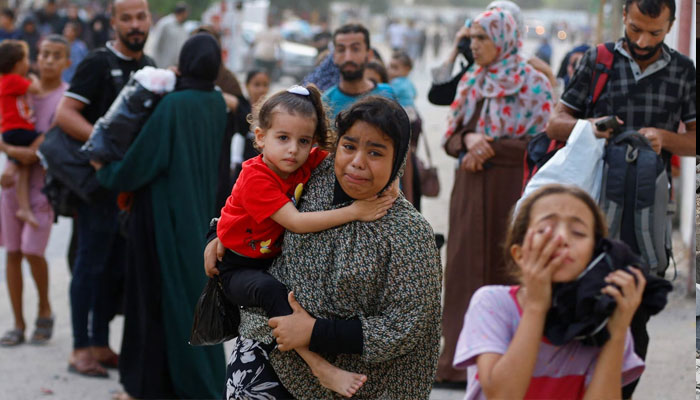 People flee their homes in Khan Younis, amid Israeli strikes in the southern Gaza Strip, October 9. —Reuters