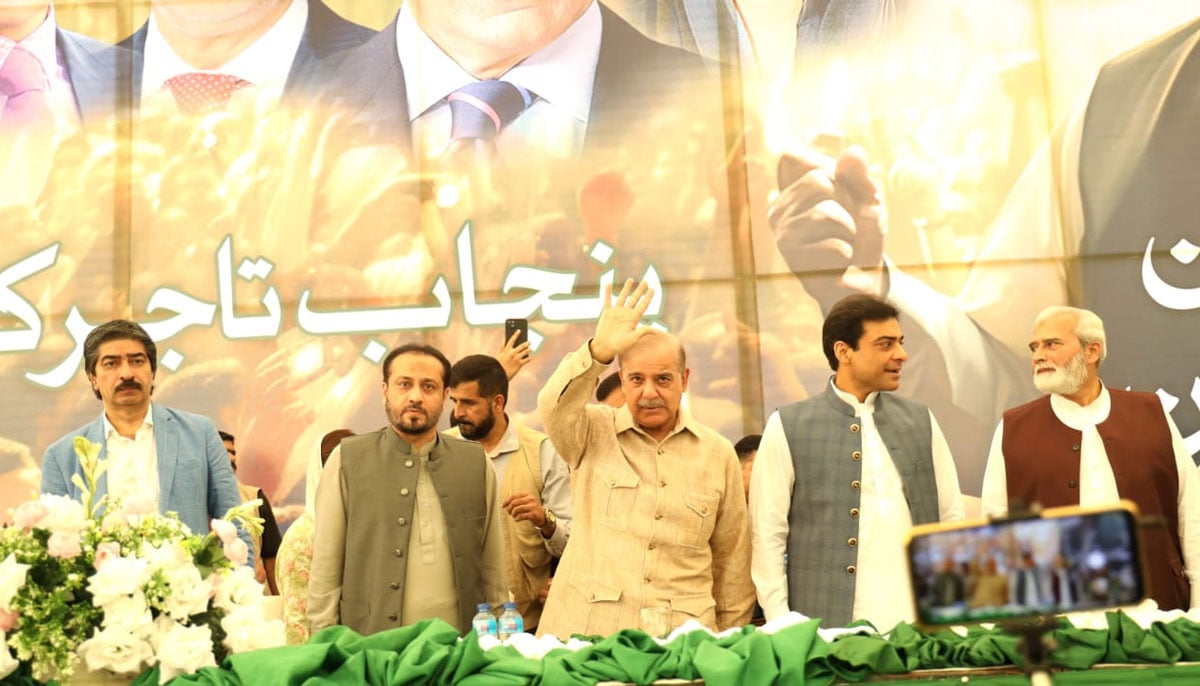 PML-N President Shehbaz Sharif and Vice President Hamza Shehbaz attend a traders convention in Lahore on October 12, 2023. — Twitter/@pmln_org