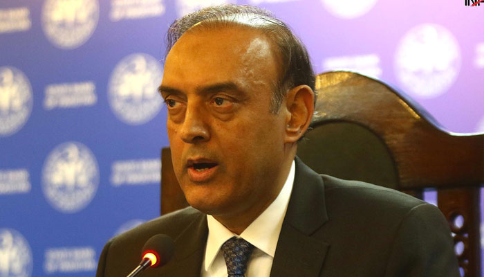 State Bank of Pakistan Governor Jameel Ahmad addressing a press conference in this undated picture. — INP