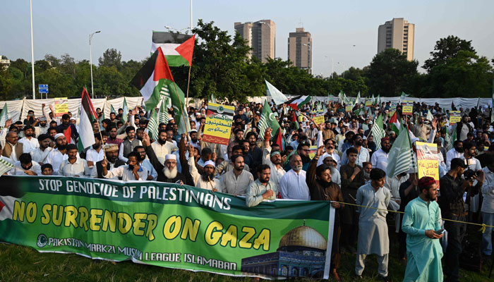 Supporters of Pakistan Markazi Muslims League (PMML) take part in a rally to express their solidarity with Palestinians, in Islamabad on October 13, 2023. — AFP