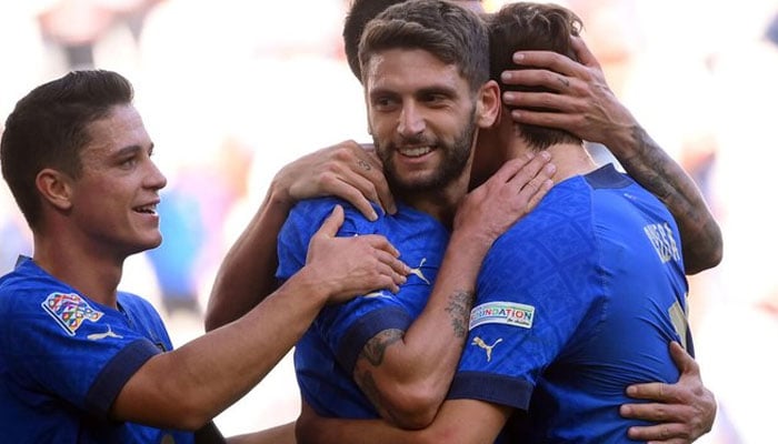 Italy dominates in Euro 2024 qualifiers, closing in on England. AFP