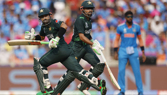 Pakistans Mohammad Rizwan and Babar Azam in action running between the wickets during India v Pakistan match in ICC Cricket World Cup 2023 at Narendra Modi Stadium, Ahmedabad, India on October 14, 2023. — Reuters