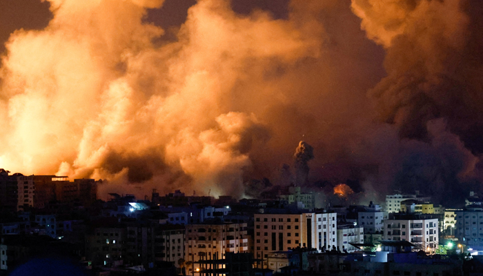 Flames and smoke billow during Israeli strikes in Gaza, October 9, 2023. — Reuters
