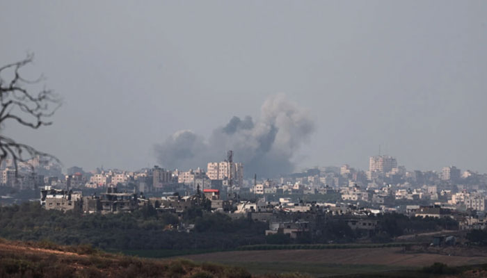 A picture taken from the southern Israeli town of Sderot on October 16, 2023, shows plums of smoke ascending over the northern Gaza Strip following Israeli military strikes, amid the ongoing battles between Israel and the Palestinian group Hamas. — AFP
