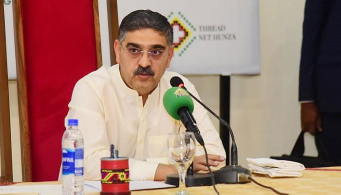 Caretaker Prime Minister Anwaar-ul-Haq Kakar chairs a meeting of political leaders, in Hunza on September 13, 2023. — PID