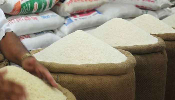 This picture shows an Indian shopkeeper selling basmati rice. —Indian news agency/File