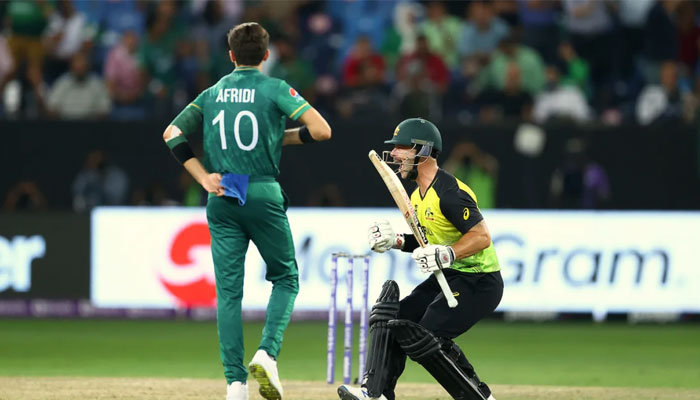 Pakistans Shaheen Shah Afridi (left) and Australias Matthew Wade during Pakistan vs Australia T20 World Cup semi-final match in Dubai on November 11, 2021. — ICC