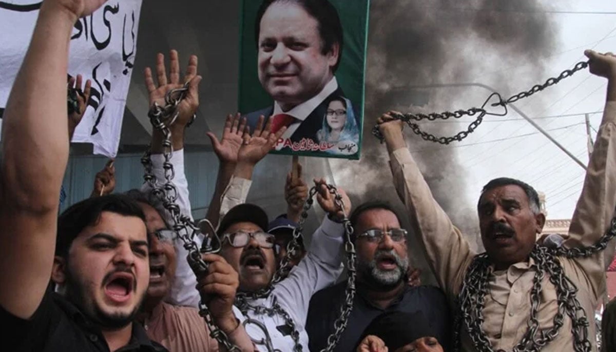 Supporters of Pakistan Muslim League-Nawaz (PML-N) chants slogans after the sentencing decision against former prime minister Nawaz Sharif, during a protest in Multan on July 7, 2018. — AFP
