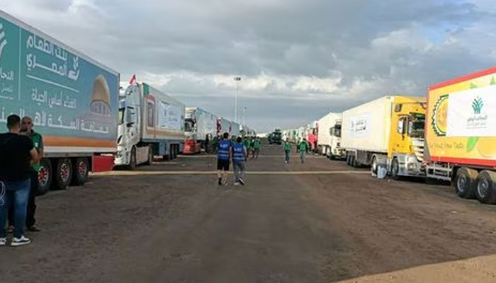 Trucks carrying humanitarian aid from Egyptian NGOs for Palestinians, wait for the reopening of the Rafah crossing on the Egyptian side, to enter Gaza. —Reuters/File