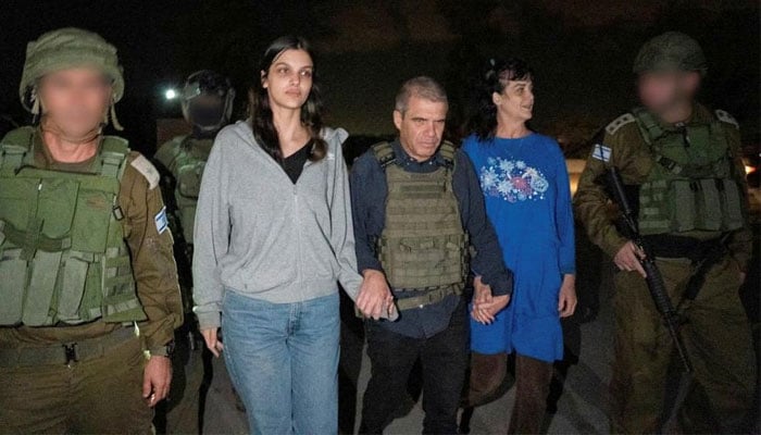 Judith Tai Raanan (R) and her daughter Natalie Shoshana Raanan, US citizens taken as hostages by Hamas, walk while holding hands with Brig-Gen (Ret) Gal Hirsch, Israels Coordinator for the Captives and Missing, after theyre released by Hamas, in response to Qatari mediation efforts, on October 20, 2023. — Reuters