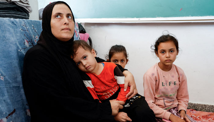 Palestinians, who fled their houses amid Israeli strikes, take shelter in a United Nations-run school, after Israels call for over 1 million civilians in northern Gaza to move south, in Khan Younis in the southern Gaza Strip, October 20, 2023. — Reuters