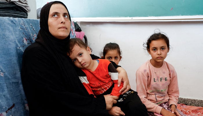 Palestinians, who fled their houses amid Israeli strikes, take shelter in a United Nations-run school, after Israels call for over 1 million civilians in northern Gaza to move south, in Khan Younis in the southern Gaza Strip, October 20, 2023. — Reuters