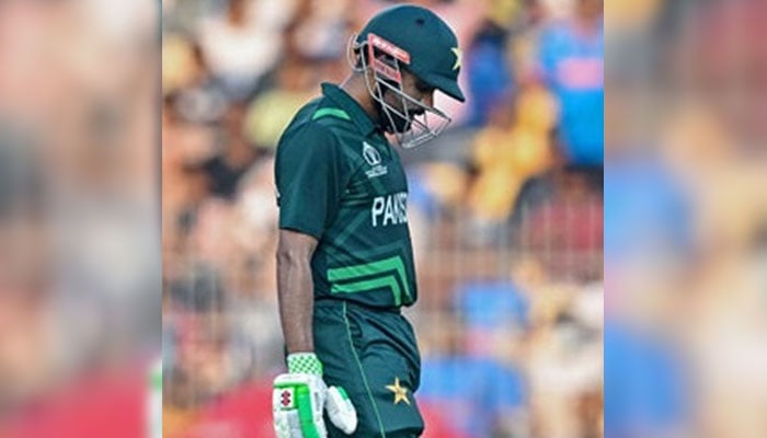 Pakistans captain Babar Azam walks back to the pavilion after his dismissal during the 2023 ICC Mens Cricket World Cup between Pakistan and Afghanistan at the MA Chidambaram Stadium in Chennai on October 23, 2023. — AFP