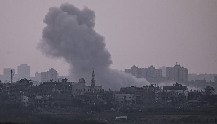 A picture taken from Israels southern city of Sderot shows smoke billowing during an Israeli airstrike on the northern Gaza Strip on October 24, 2023. — AFP