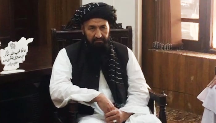 Hafiz Mohibullah Shakir, the acting consul general at the Afghan Consulate in Peshawar, during a meeting in Peshawar, on October 25, 2023, in this still taken from a video. — Reporter