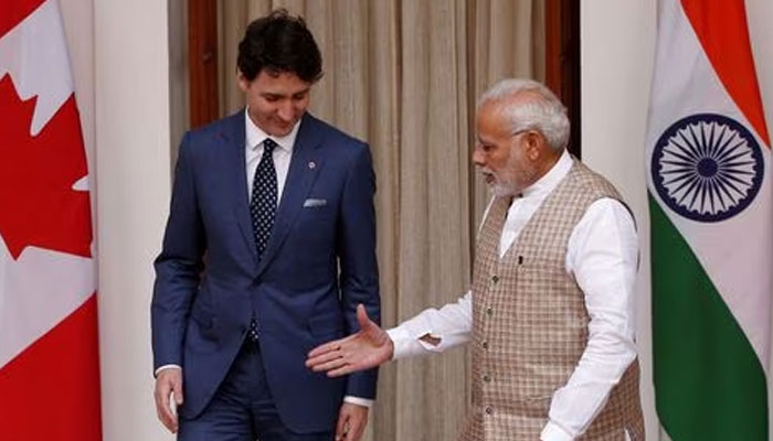 Indian Prime Minister Narendra Modi (R) extends his hand for a handshake with his Canadian counterpart Justin Trudeau during a photo opportunity ahead of their meeting at Hyderabad House in New Delhi, India, February 23, 2018.—Reuters