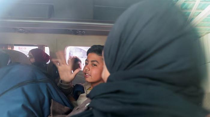 Palestinians enter Gaza via Rafah for first time in 18 months under tight curbs