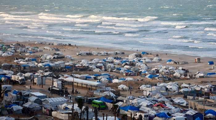 Gaza residents face harsh conditions in waterlogged tents: UNRWA