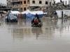 Freezing rain floods tents as displaced Palestinians face bitter cold