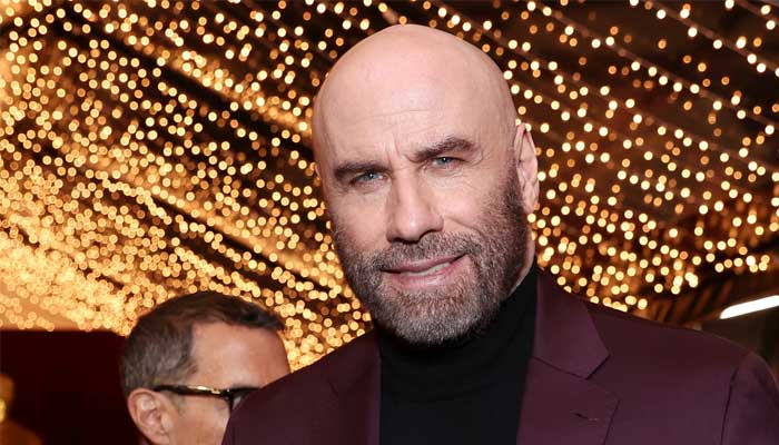 John Travolta pays tribute to Bill Kenwright