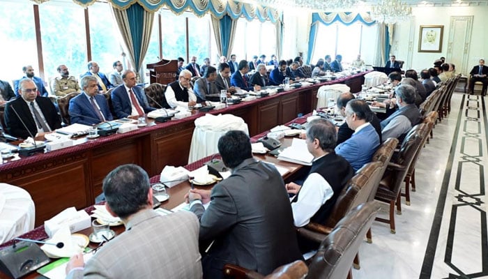 Caretaker Prime Minister Anwaar-ul-Haq Kakar chairing a SIFC meeting at the PM House. — PID/File