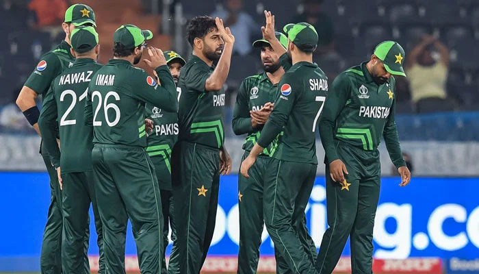 Pakistans Haris Rauf celebrates with teammates after taking the wicket of Netherlands captain Scott Edwards during the World Cup at the Rajiv Gandhi International Stadium in Hyderabad on October 6, 2023. — AFP