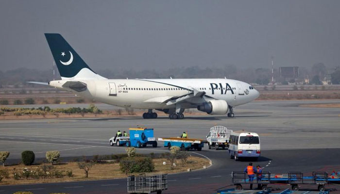 A Pakistan International Airlines (PIA) plane prepares to take-off at Alama Iqbal International Airport in Lahore February 1, 2012. — Reuters