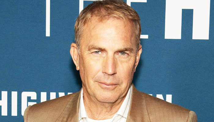 Kevin Costner seemed to be in high spirits as he shopped for womens dresses with a mystery brunette