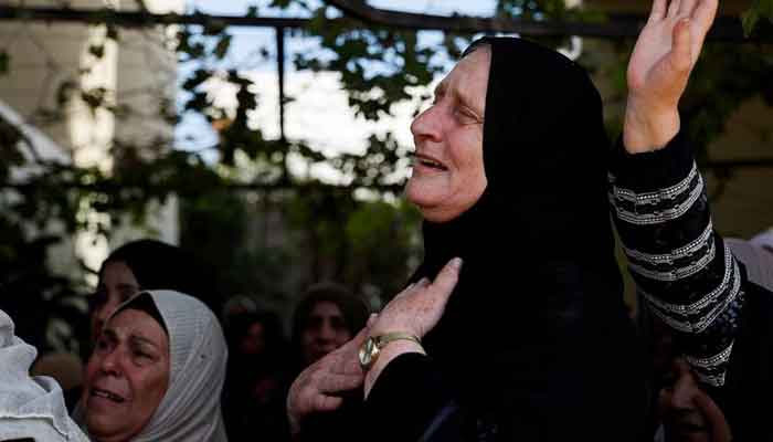 A mourner reacts during the funeral of Palestinian Labib Dumaidi, 19, who was killed in an Israeli settlers attack, near Nablus in the Israeli-occupied West Bank on October 6, 2023. —Reuters