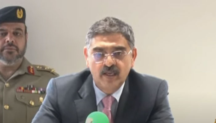 Caretaker Prime Minister Anwaar-ul-Haq Kakar talking to the media in Lahore. — Screengrab/YouTube/PTV