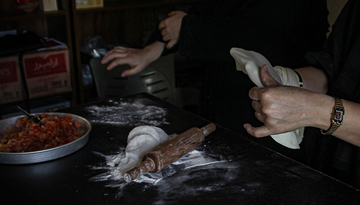 Masooma prepares the dough for Bolani. — Hassaan Ahmed