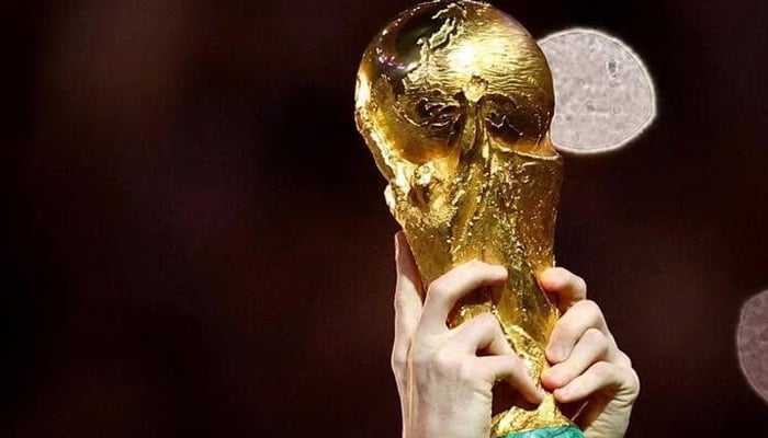 Soccer Football - FIFA World Cup Qatar 2022 - Final - Argentina v France - Lusail Stadium, Lusail, Qatar - December 18, 2022 General view of Argentinas Lionel Messi lifting the trophy as he celebrates winning the World Cup. — Reuters