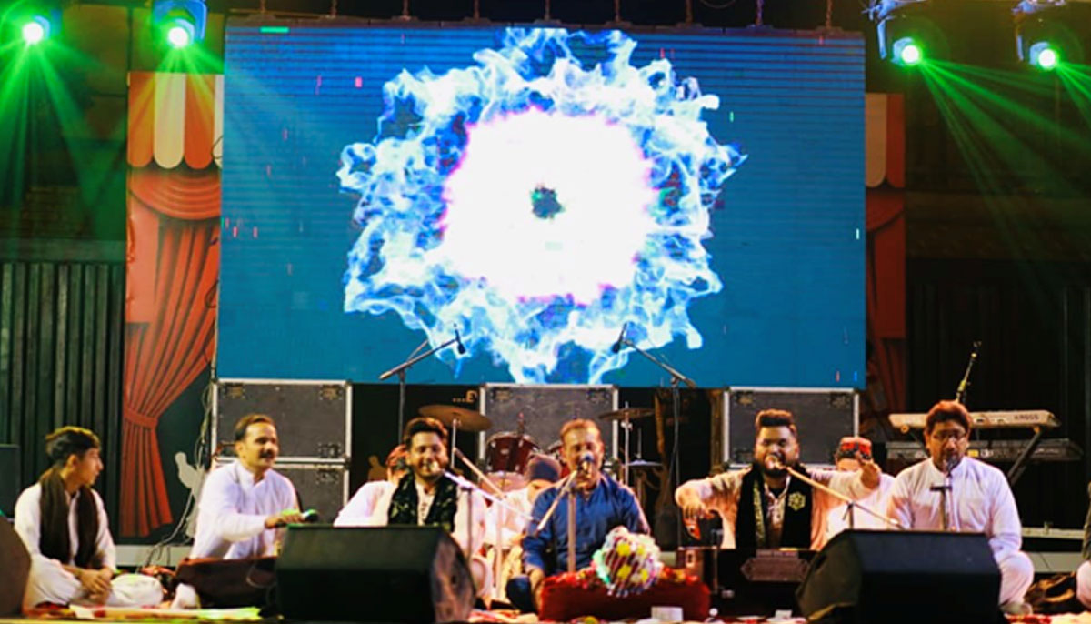 Ali Akbar Razi (centre) performs with his sons Fattah Ali (second from right) and Turab Ali (third from left). — Photo via author