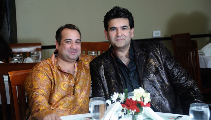 Global singing sensation Ustad Rahat Fateh Ali Khan and his former international promoter and arts agent Salman Ahmed. — Reporter